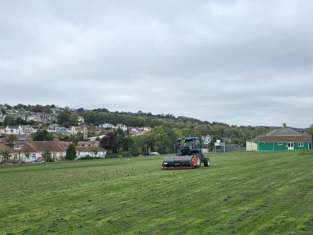 Verti-Draining at Anning Road Playing Field tractor on the field